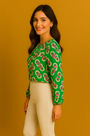 Printed blouse with swirl pattern in varied tones, fluid drape and modest fit on a neutral background — Swirl Delight by RIXA.